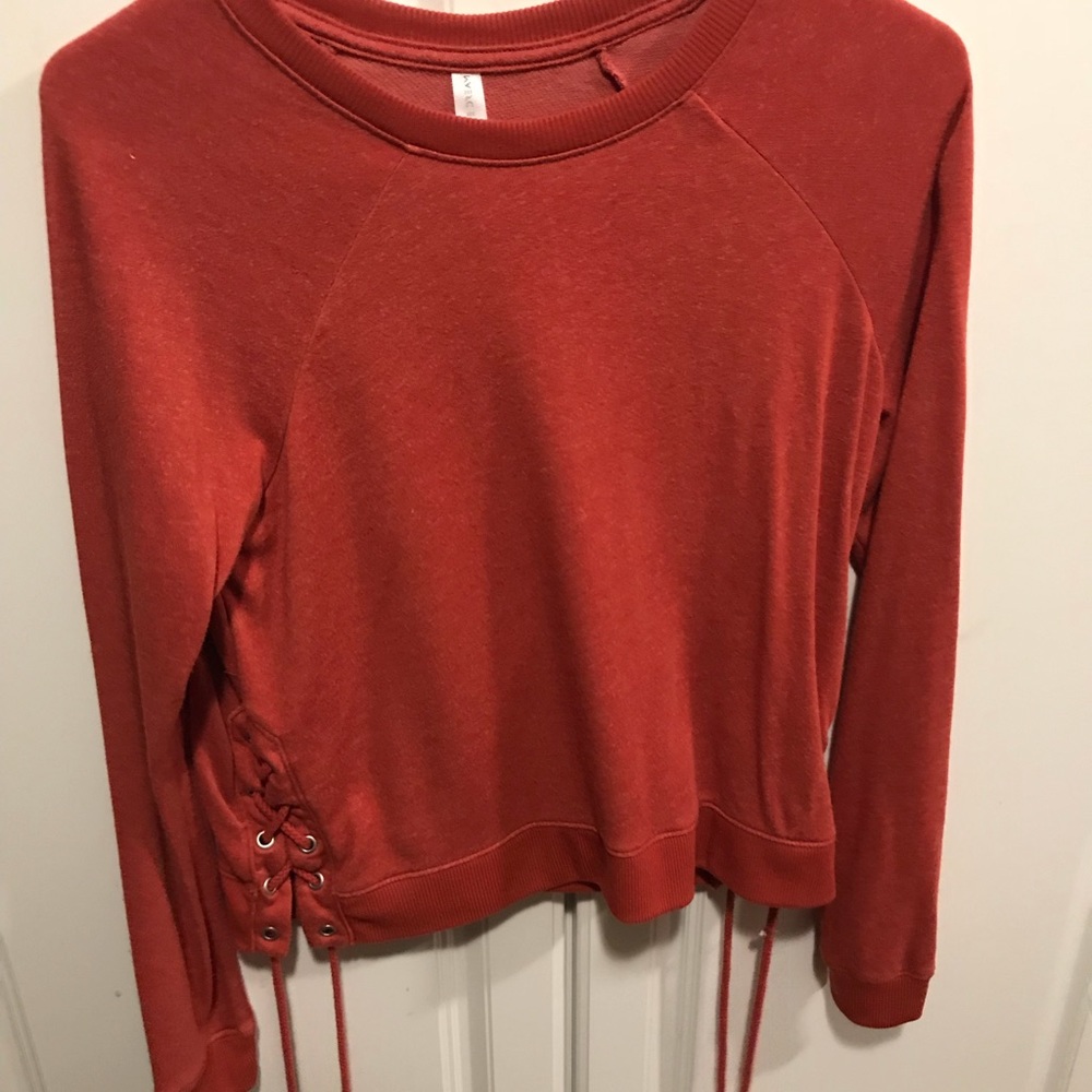 Burnt orange Crew neck pullover with lace up sides